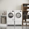 Wasmachine verhoger met lade in een moderne wasruimte.